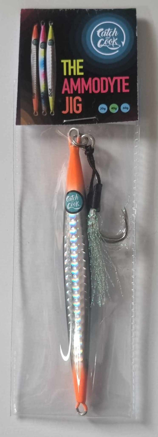 The Ammodyte Jig 60g Orange/Black Silver - with twin assist hooks